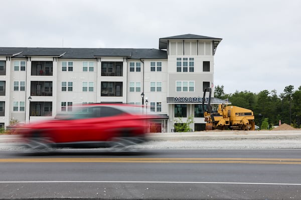Construction equipment appears in front of the Monument apartment village along Quacco Road in Pooler. More than 7,000 new rental units have come on the Savannah rental market in the last three years. (Arvin Temkar/AJC)