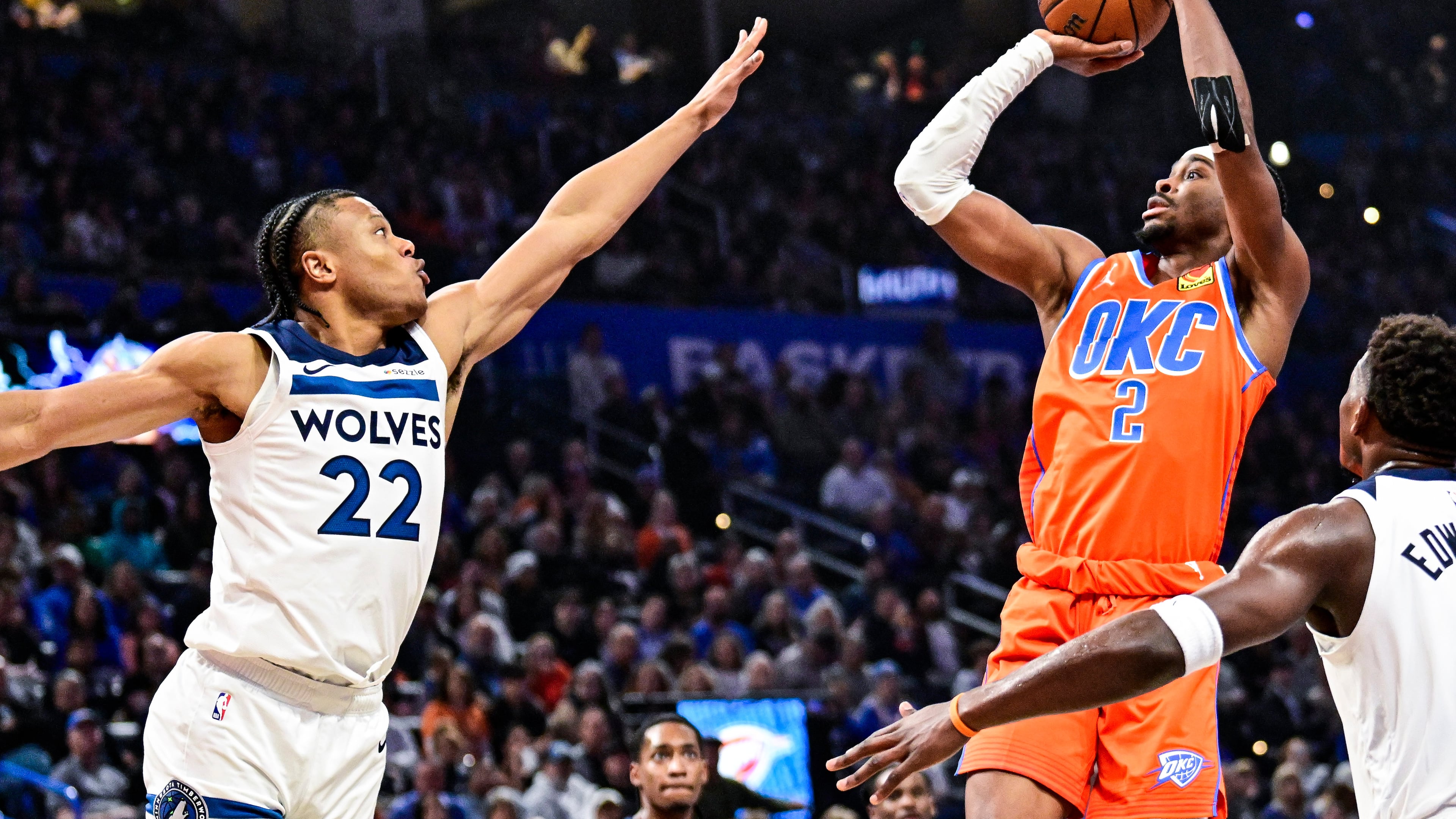 Oklahoma City Thunder guard Shai Gilgeous-Alexander (2) shoots against Minnesota Timberwolves guard Jaylen Clark (22) during the first half of an Emirates NBA Cup basketball game, Wednesday, Nov. 26, 2025, in Oklahoma City. (AP Photo/Gerald Leong)