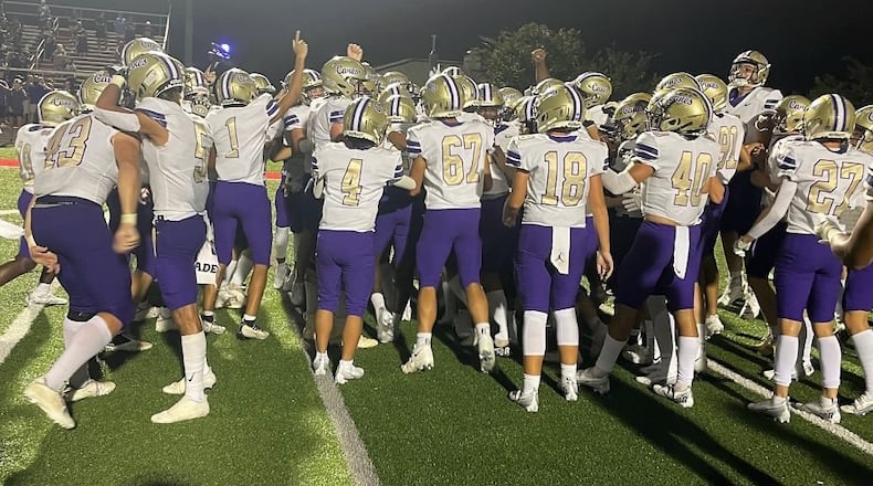 Cartersville players celebrate their 28-20 come-from-behind victory over Allatoona on Sept. 2, 2022, in Acworth.