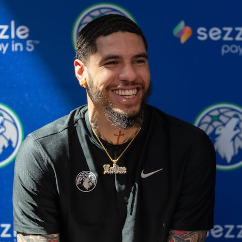 Minnesota Timberwolves newly-acquired point guard LaMelo Ball laughs during an introductory press conference at the Target Center in Minneapolis on Tuesday, July 14, 2026. (Alex Kormann/Minnesota Star Tribune via AP)