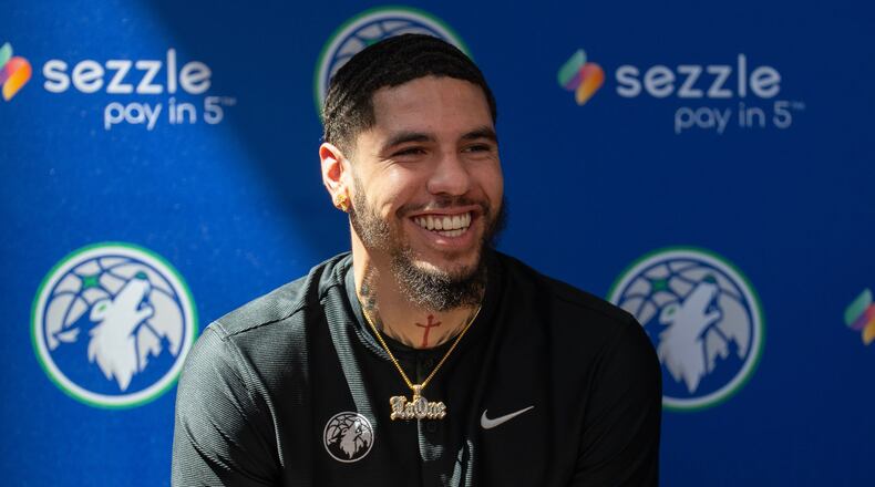 Minnesota Timberwolves newly-acquired point guard LaMelo Ball laughs during an introductory press conference at the Target Center in Minneapolis on Tuesday, July 14, 2026. (Alex Kormann/Minnesota Star Tribune via AP)