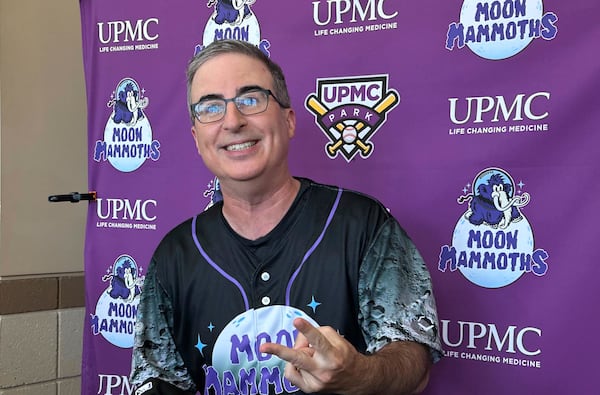 John Oliver speaks to media before a baseball game between the Chesapeake Oyster Catchers and the Erie Moon Mammoths at UMPC Park in Erie, Pa., on Saturday, July 19, 2025. (AP Photo/Joe Reedy)