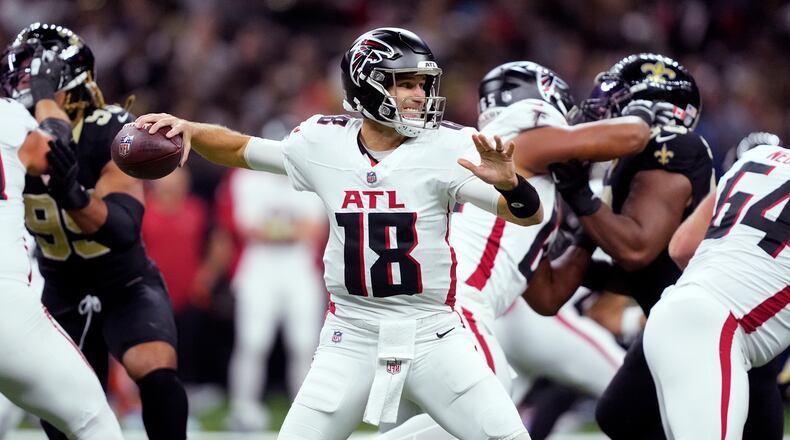 Atlanta Falcons quarterback Kirk Cousins drops back to pass against the New Orleans Saints in the first half of an NFL football game, Sunday, Nov. 23, 2025, in New Orleans. (Gerald Herbert/AP)