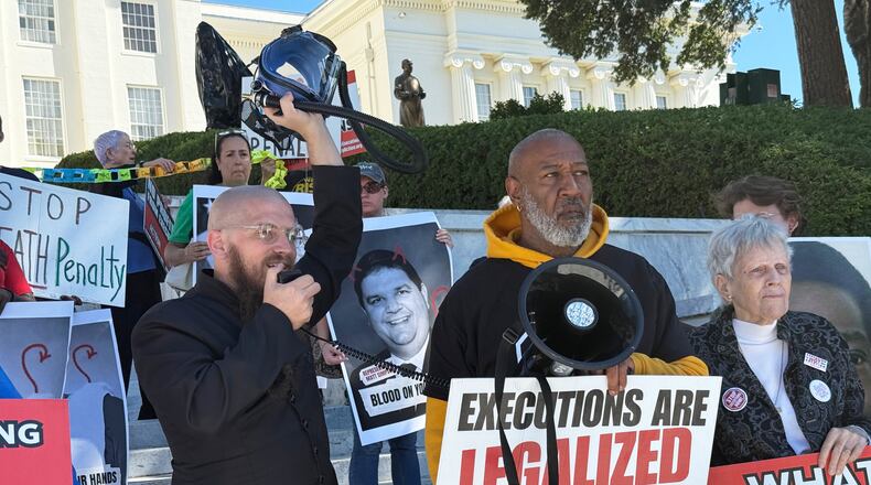 The Rev. Jeff Hood speaks at a protest against the death penalty on Wednesday, Oct. 22, 2025, at the Alabama Capitol in Montgomery, Ala. (AP Photo/Kim Chandler)