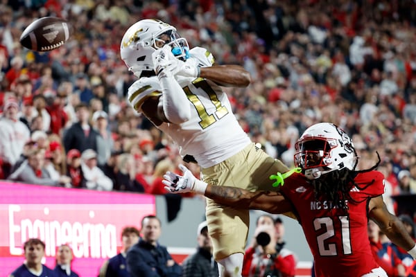 The ball slips through receiver Dean Patterson's hands during Georgia Tech's loss to NC State.