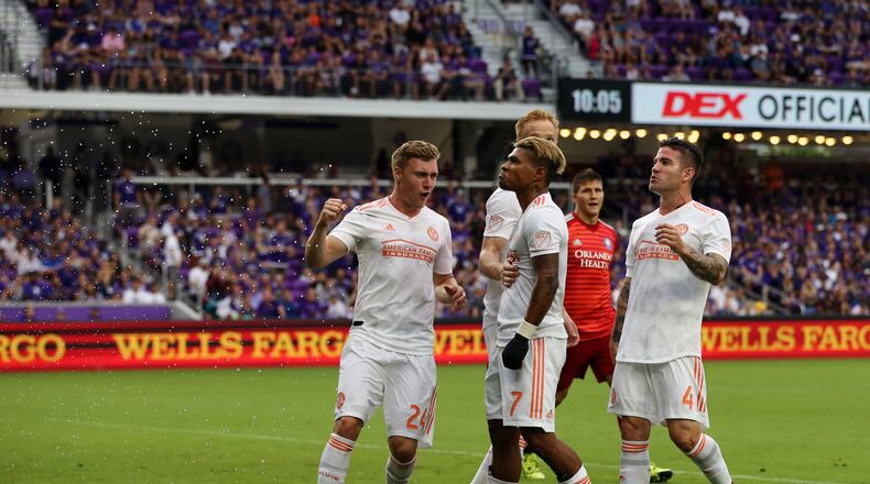 Water from bottles can be seen on the left from debris thrown onto the field from some Orlando City supporters during Sunday's 2-1 loss to Atlanta United. (Atlanta United)