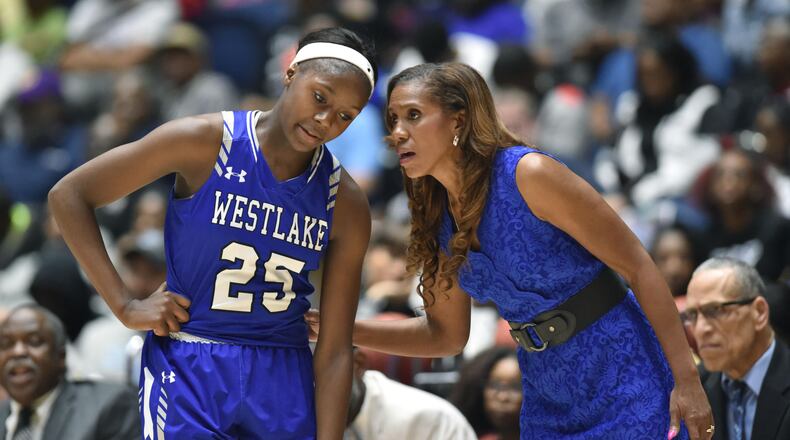 Westlake head coach Hilda Hankerson instructs Raven Johnson (25) in the GHSA Class AAAAAAA championship game Saturday, March 9, 2019, at the Macon Centreplex in Macon.