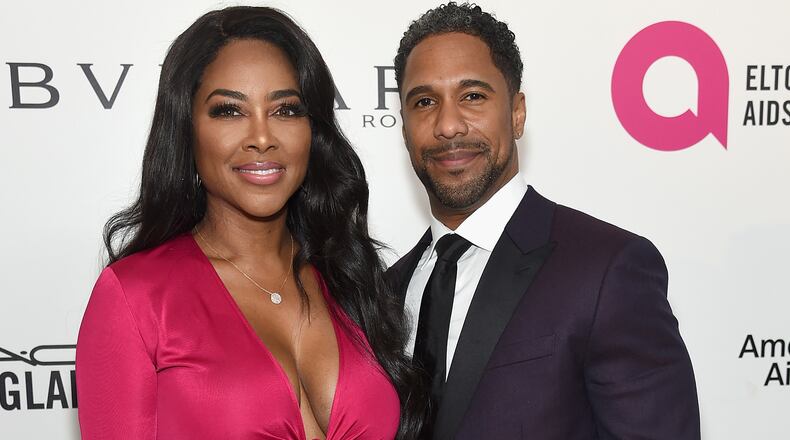 WEST HOLLYWOOD, CA - MARCH 04:  (L-R) Kenya Moore and Marc Daly attend the 26th annual Elton John AIDS Foundation's Academy Awards Viewing Party at The City of West Hollywood Park on March 4, 2018 in West Hollywood, California.  (Photo by Jamie McCarthy/Getty Images for EJAF)