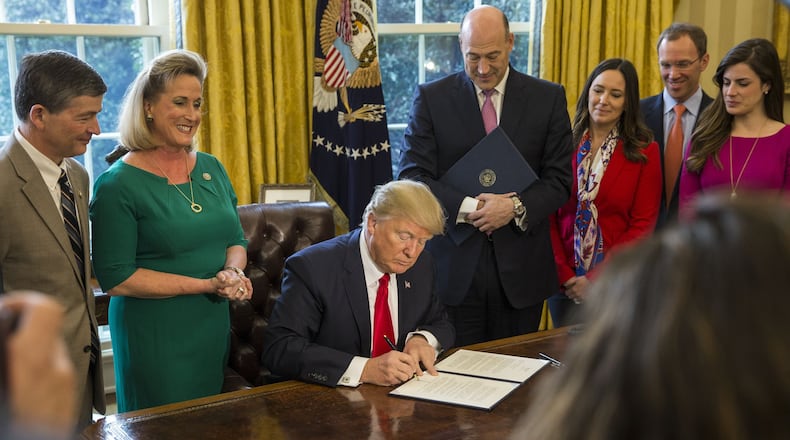 President Donald Trump on Monday signed a revised executive order temporarily barring travel from six Muslim-majority countries and pausing the refugee resettlement program. (Feb. 3, 2017. Al Drago/The New York Times)