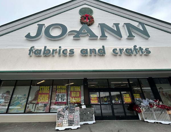 Store closing signs appear in the window at a Joann Fabric and Crafts store in Barre, Vt., on Saturday, March 8, 2025. (AP Photo/Carolyn Lessard)