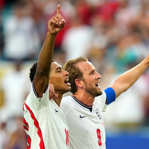 Jude Bellingham, left, and Harry Kane celebrates England's victory over Norway in a World Cup quarterfinal soccer match in Miami Gardens, Fla., Saturday, July 11, 2026. (AP Photo/Julio Cortez)