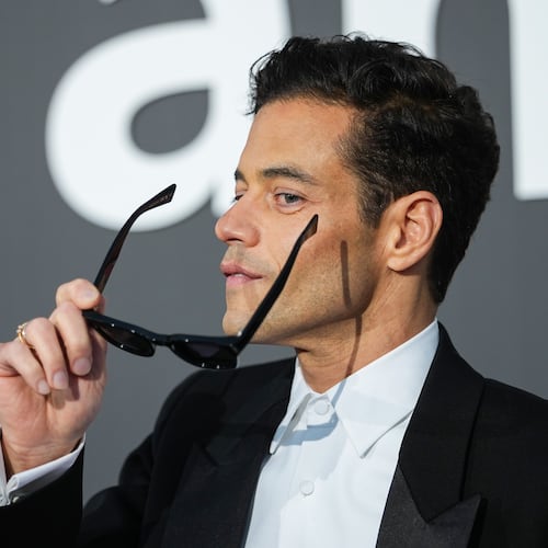 Rami Malek poses for photographers upon arrival at the amfAR Cinema Against AIDS benefit at the Hotel du Cap-Eden-Roc, during the 79th Cannes international film festival, Cap d'Antibes, southern France, Thursday, May 21, 2026. (Photo by Scott A Garfitt/Invision/AP)A
