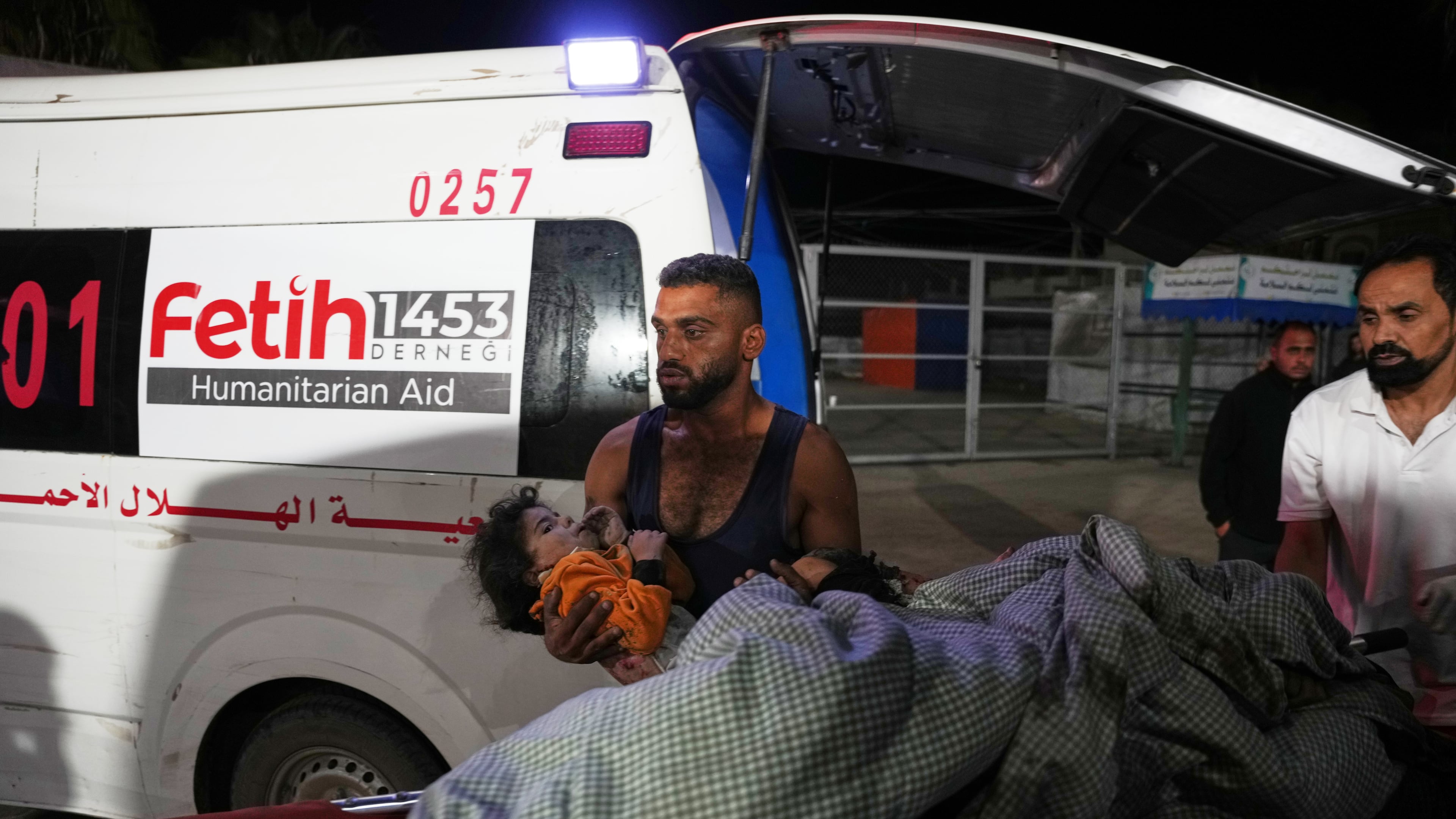 Palestinians injured in an Israeli army strike are brought to Al-Aqsa Hospital in Deir al-Balah, Gaza Strip, Wednesday, Oct. 29, 2025. (AP Photo/Abdel Kareem Hana)