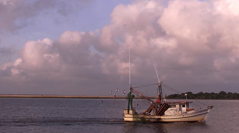 A shrimp boat on the Apalachicola River at sunset. (Paul J. Milette/The Palm Beach Post)