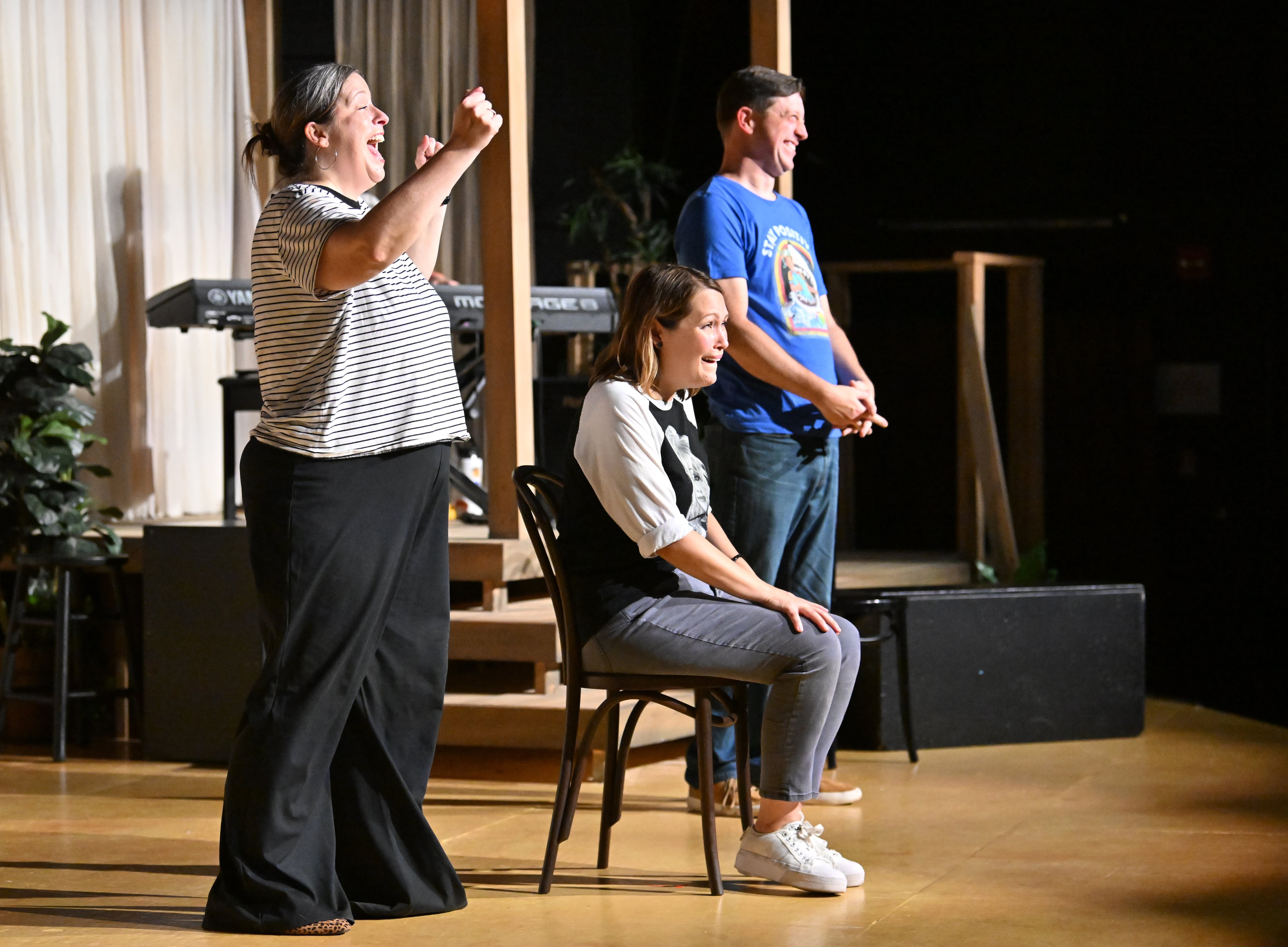 Amber Nash (center) plays a teenage girl during an improv sketch Friday night. Nash got her start at Dad's Garage before going on to become the voice for Pam Poovey on FX’s “Archer.” (Hyosub Shin/AJC)