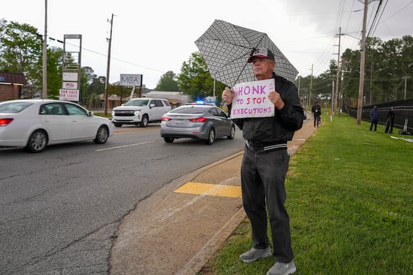 Bucky Bruce demonstrates outside the scheduled execution of South Carolina inmate Mikal Mahdi in Columbia, S.C., Friday, April 11, 2025. (AP Photo/David Yeazell)