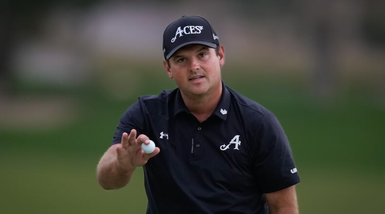 Patrick Reed of the United States reacts after winning the Dubai Desert Classic in United Arab Emirates, Sunday, Jan. 25, 2026. (AP Photo/Altaf Qadri)