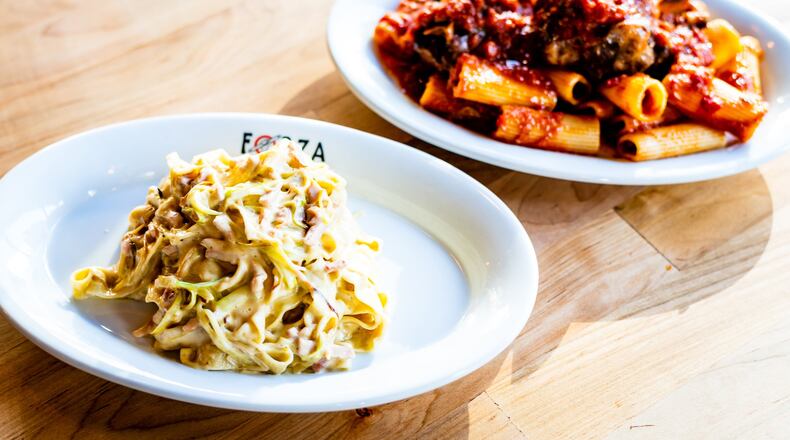Pastas at Forza Storico include Papalina (left; creamy fettuccine tossed with fat slivers of prosciutto cotto) and Sugo di Coda (rigatoni in tomato sauce with bone-in oxtail). CONTRIBUTED BY HENRI HOLLIS
