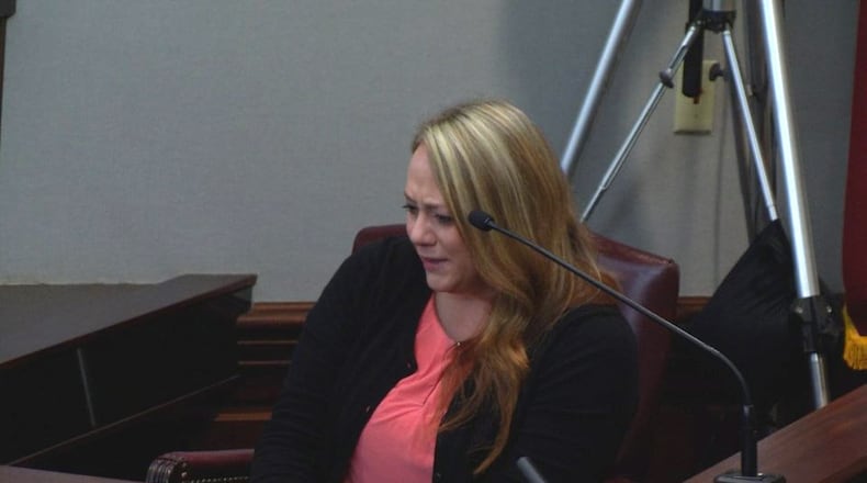 Leanna Taylor, the ex-wife of Justin Ross Harris, breaks down while testifying about how she learned that Cooper had died, during Harris' murder trial at the Glynn County Courthouse in Brunswick, Ga., on Monday, Oct. 31, 2016. (screen capture via WSB-TV)