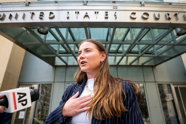 College soccer player Lexi Drumm leaves federal court during a hearing for a landmark $2.8 billion settlement impacting NCAA college athletics on Monday, April 7, 2025, in Oakland, Calif. (AP Photo/Noah Berger)