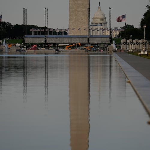 The U.S. Capitol and the Washington Monument are reflected in the Lincoln Memorial Reflecting Pool Thursday, June 25, 2026, in Washington. (AP Photo/Carolyn Kaster)