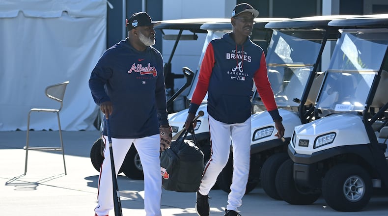 Atlanta Braves first base coach Eric Young Sr. (left) and third base coach Ron Washington are seen on the first of the Braves pitchers and catchers report to spring training at CoolToday Park, Monday, Feb. 13, 2023, in North Port, Fla.. (Hyosub Shin / Hyosub.Shin@ajc.com)