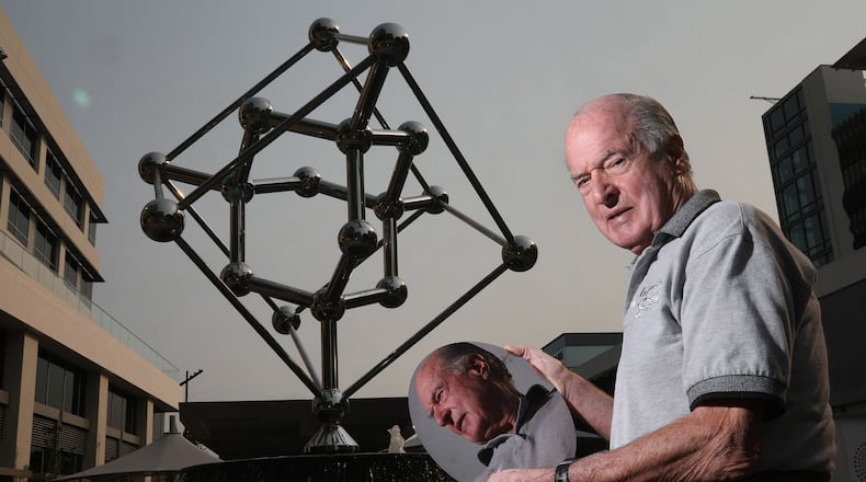 Jacques Beaudouin’s long quest to commemorate the birthplace of Silicon Valley, William Shockley’s Bell Lab location in Mountain View, Calif., is finally being realized as he poses with a silicon wafer next to a sculpture of a silicon molecule at the Village of San Antonio Center, Tuesday, Aug. 7, 2018. (Karl Mondon/Bay Area News Group/TNS)