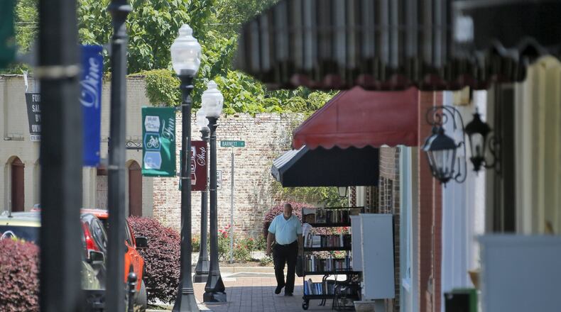Businesses along East Main Street in Hampton. Officials want to establish an incubator to bring more business to Henry County. BOB ANDRES/BANDRES@AJC.COM