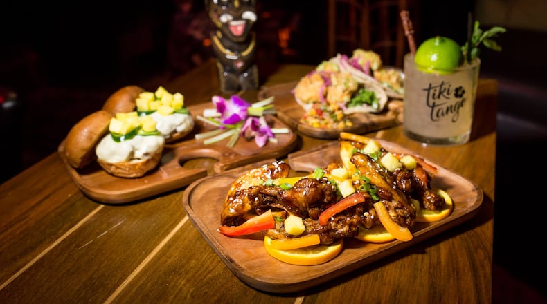 Tiki Tango Crispy Sesame Wings, Aloha Sliders, Tiki Tango Tacos, El Diablo cocktail and Mai Tai cocktail. Photo credit- Mia Yakel.