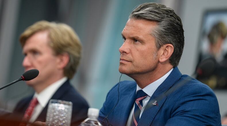 Defense Secretary Pete Hegseth listens during a meeting with Iraq's Prime Minister Ali al-Zaidi at the Pentagon Tuesday, July 14, 2026, in Washington. (Al Drago/Pool via AP)