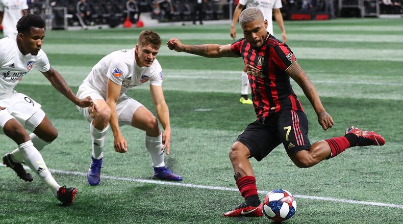 Atlanta United midfielder Josef Martinez takes a shot on goal that is blocked by FC Cincinnati during the second half in their MLS soccer match on Sunday, March 10, 2019, in Atlanta. Curtis Compton/ccompton@ajc.com
