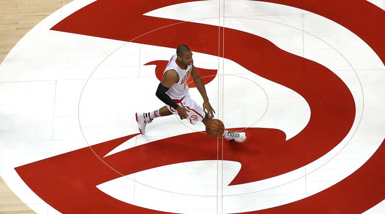 Hawks’ Al Horford drives the court against the Wizards in a basketball game on Monday, March 21, 2016, in Atlanta. Curtis Compton / ccompton@ajc.com