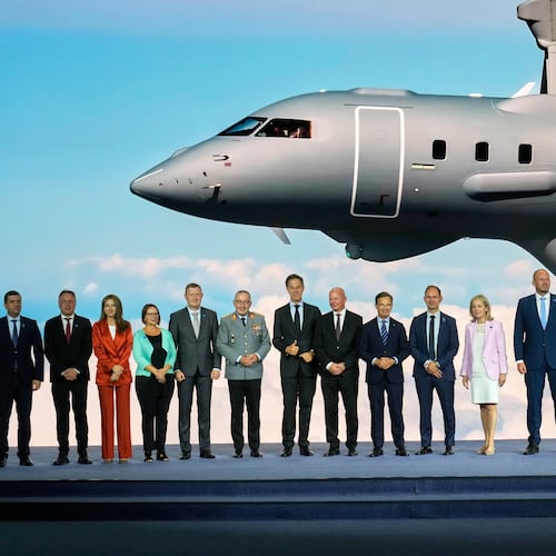 NATO Secretary General Mark Rutte, center, poses with NATO defense ministers and industry representatives during the opening of the NATO Defense Industry Forum on the sidelines of the NATO summit in Ankara, Turkey, Tuesday, July 7, 2026. (AP Photo/Hussein Malla)