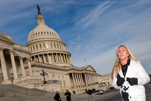 Rep. Marjorie Taylor Greene, R-Ga., arrives to a news conference outside the U.S. Capitol in November. (Julia Demaree Nikhinson/AP)