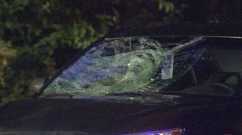 A car hit rappers shooting a music video on the Jackson Street Bridge. The car's windshield was shattered.