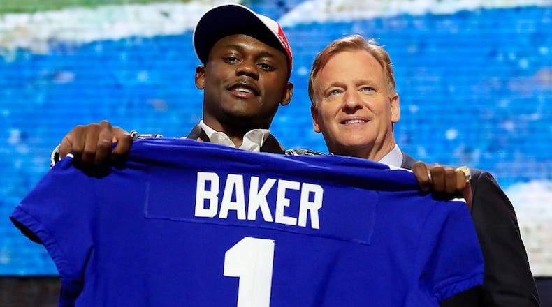 Deandre Baker of Georgia poses with NFL Commissioner Roger Goodell after being chosen No. 30 overall by the New York Giants during the first round of the 2019 NFL Draft on April 25, 2019 in Nashville, Tennessee. (Photo by Andy Lyons/Getty Images)