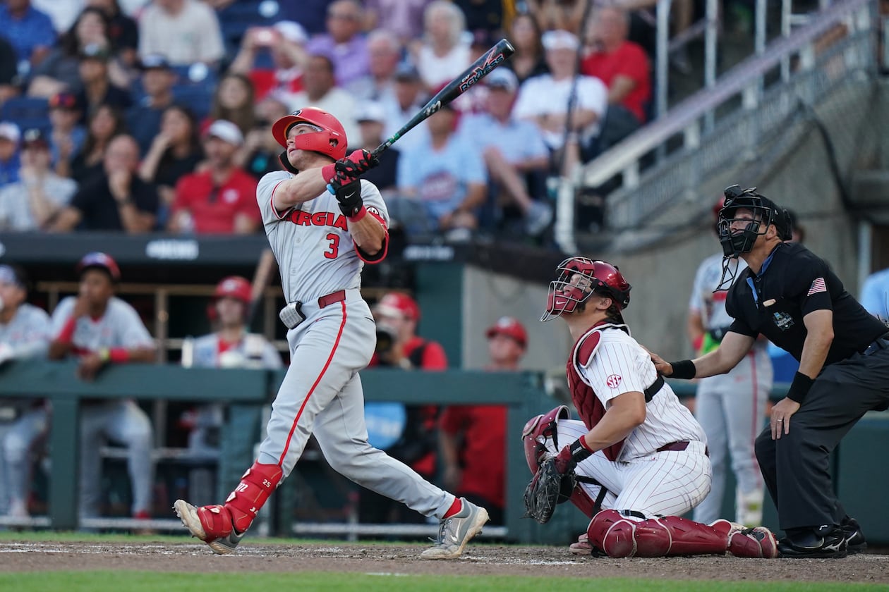 Georgia catcher Daniel Jackson (3) hits a homer during an NCAA baseball College World Series game against Oklahoma, Monday, June 15, 2026 in Omaha, Neb. Oklahoma won 4-3. (Vera Nieuwenhuis/AP)