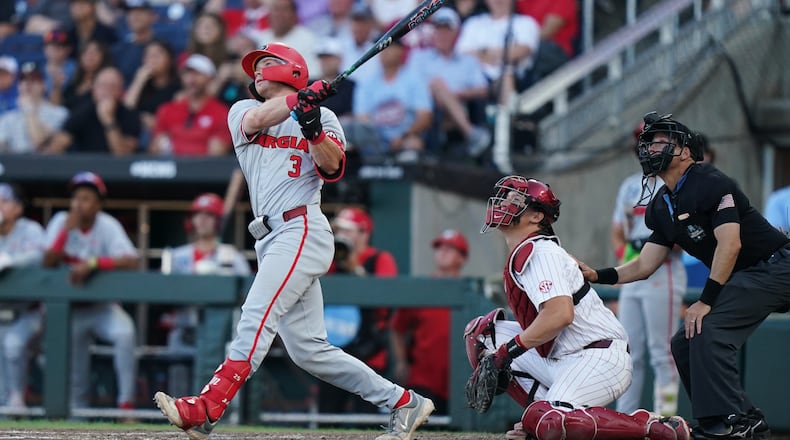 Georgia catcher Daniel Jackson (3) hits a homer during an NCAA baseball College World Series game against Oklahoma, Monday, June 15, 2026 in Omaha, Neb. Oklahoma won 4-3. (Vera Nieuwenhuis/AP)
