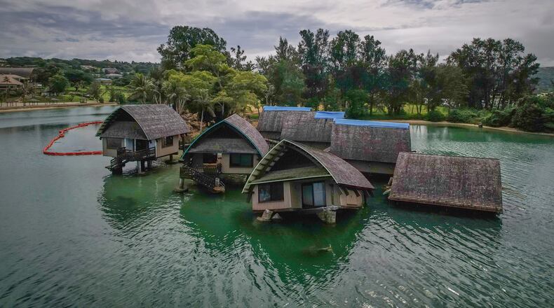 FILE - The once iconic Holiday Inn villas in Port Vila, Vanuatu, sit partially sunken, July 19, 2025, after being hit by multiple cyclones and an earthquake that caused irreparable damage. (AP Photo/Annika Hammerschlag, File