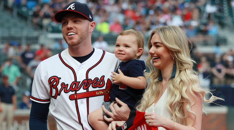 Braves All-Star Freddie Freeman is presented his All-Star jersey by his wife Chelsea and son Charlie before playing the Toronto Blue Jays in a MLB baseball game on Tuesday, July 10, 2018, in Atlanta. (Curtis Compton/ccompton@ajc.com)