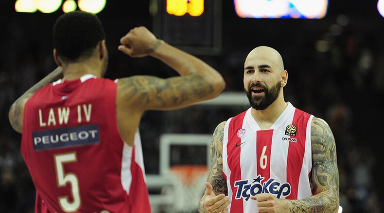 Power forward Pero Antic played with former Hawks guard Acie Law (left) at Olympiacos Piraeus in Euroleague.