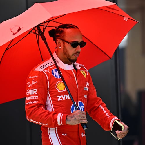 Ferrari driver Lewis Hamilton of Britain walks through the paddock ahead of the Austrian F1 Grand Prix, in Spielberg, Austria, Thursday, June 25, 2026. (AP Photo/Denes Erdos)