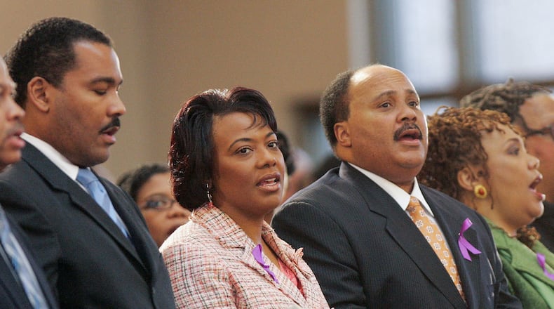 In this Feb. 6, 2006 file photo, the children of Martin Luther King Jr., and Coretta Scott King, left to right, Dexter Scott King, Rev. Bernice King, Martin Luther King III and Yolanda King participate in a musical tribute to their mother at the new Ebenezer Baptist Church in Atlanta. A judge in Atlanta is set to hear motions Tuesday, Jan. 13, 2015, in a lawsuit that pits Martin Luther King Jr.’s two sons against his daughter Bernice in a dispute over two of his most cherished items. (AP Photo/John Bazemore, File)