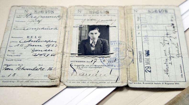 The travel document of Joseph Stripounsky, who was 17 when he fled Belgium with his family, is shown at the Holocaust Memorial Museum in Washington, Wednesday, June 7, 2017. The U.S. Holocaust Memorial Museum is launching its first-ever crowd-funding campaign in an effort to preserve and digitize more than 200 diaries from Holocaust victims and survivors. (AP Photo/Manuel Balce Ceneta)