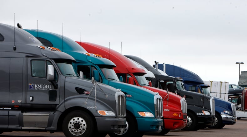 FILE - In this May 21, 2009 file photo, big rigs stack up at the Flying J Truck Stop along Interstate 70 near the small Colorado plains community of Limon. Many tractor-trailers on the nations roads are driven faster than the 75 mph their tires are designed to handle, a practice that has been linked to wrecks and blowouts but has largely escaped the attention of highway officials. (AP Photo/David Zalubowski, File)
