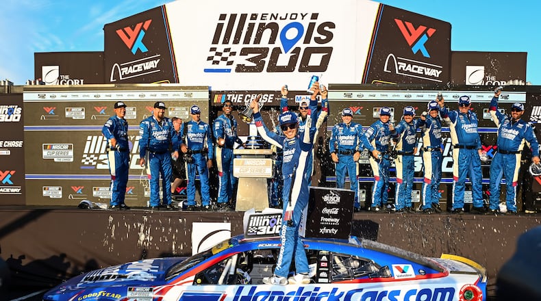 Kyle Larson celebrates after winning a NASCAR Cup Series auto race Sunday, Sept. 13, 2026, in Madison, Ill. (AP Photo/Connor Hamilton)