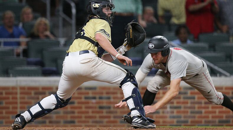 May 9, 2017, Atlanta: Georgia’s Mitchel Webb scores what proved to be the winning run on a RBI single by Keegan McGovern past Georgia Tech catcher Kyle McCann for a 8-7 victory over Georgia Tech during the 9th inning of the Spring Classic in a NCAA college baseball game at SunTrust Park on Tuesday, May 9, 2017, in Atlanta. Curtis Compton/ccompton@ajc.com