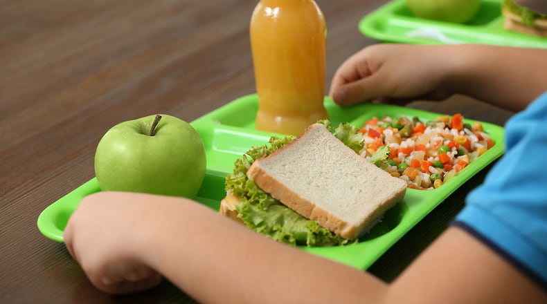 Approximately one-third of parents who pay full or reduced price for school lunch report financial hardship and inability to routinely feed their children at school as a result of school lunch costs. (Dreamstime/TNS)