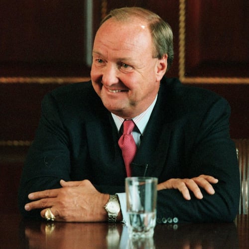 Sports owner Tom Hicks, left, talks at a TXCN taping of a roundtable discussion about his Rangers, Stars, and dealing with University of Texas athletics, at his office, April 23, 2003, in Dallas. (Helen Jau/The Dallas Morning News via AP)
