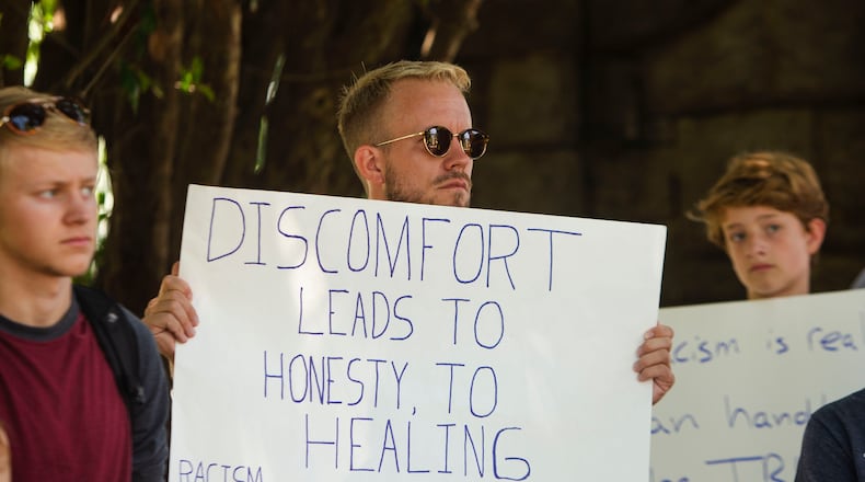 David Harbin, an educator at City Schools of Decatur, participates in a back-to-school rally for Georgia educators on Saturday, July 23, 2022, at Piedmont Park in Atlanta. Teachers, community members and students gathered to speak against new state legislative action banning selected books from school libraries and prohibiting the teaching of divisive concepts in U.S. History. (Christina Matacotta for The Atlanta Journal-Constitution)